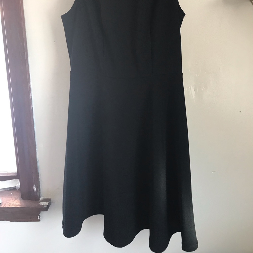 Black, sleeveless, flair dress